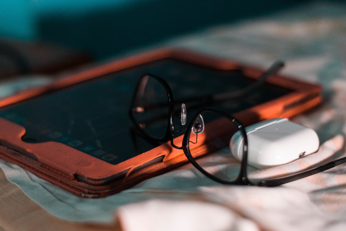 A pair of glasses representing Transitions photochromic lenses